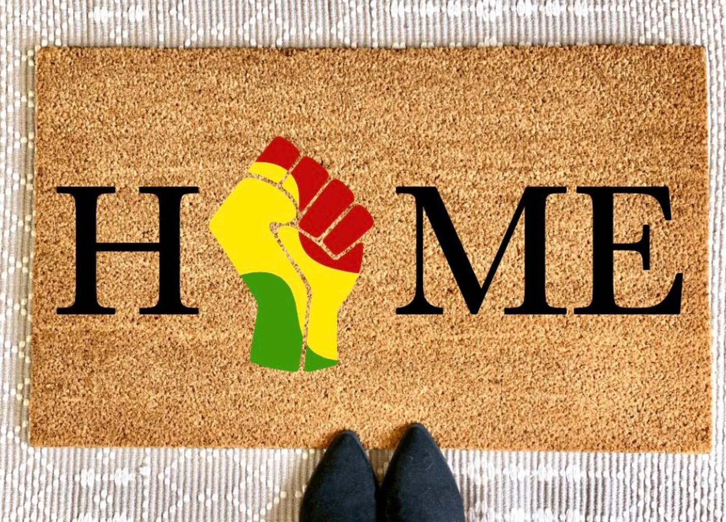Home Raised Fist Doormat
